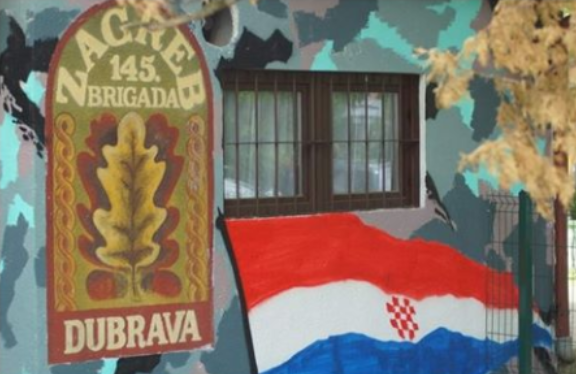 ‘KOME SU SMETALE SVETINJE?’ Preko noći prefarbani tek obnovljen grafit zastave i grb brigade u Dubravi